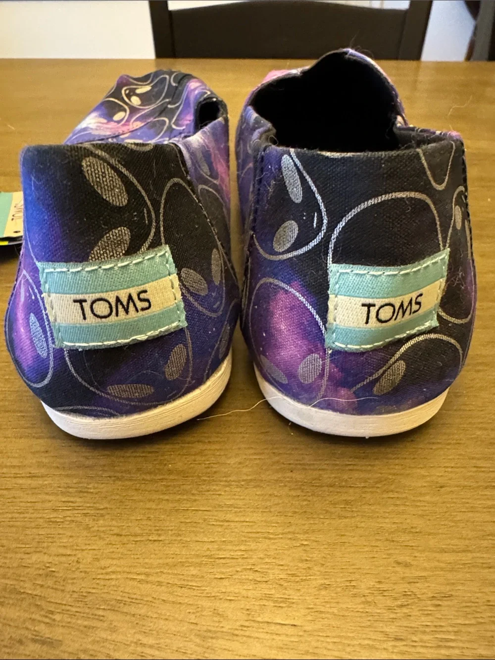 Toms Women’s Alien Galaxy Slip-On Sneakers in Purple, Black and Pink